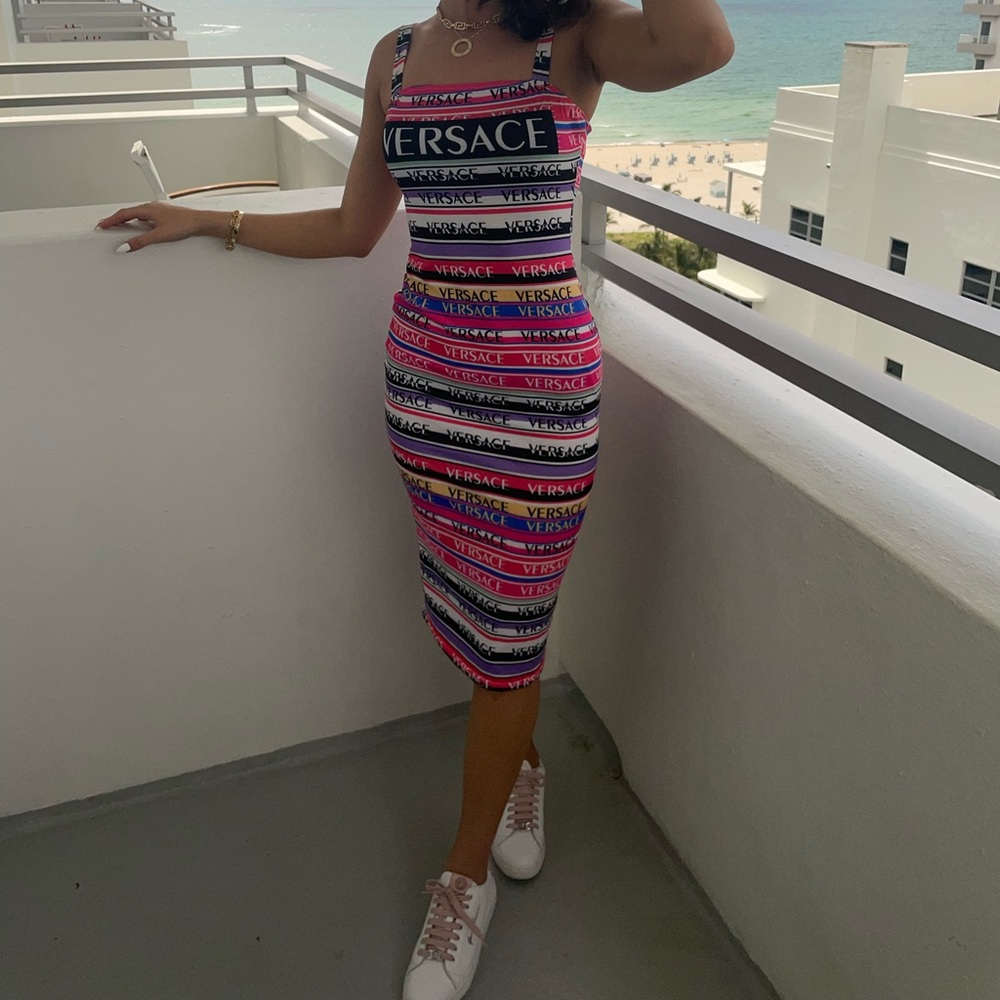 “Versace” bodycon dress size Small but could fit a medium it was little loose